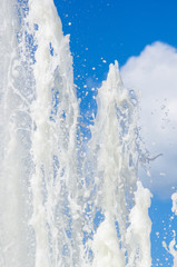 Fountain in city park on hot summer day