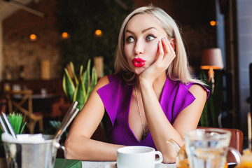 Cute Woman chatting in Restaurant