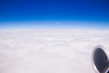 Naklejka na ściany i meble Bird eye view of cloudy on sky from airplane