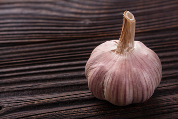 fragrant garlic on a wooden rustic background