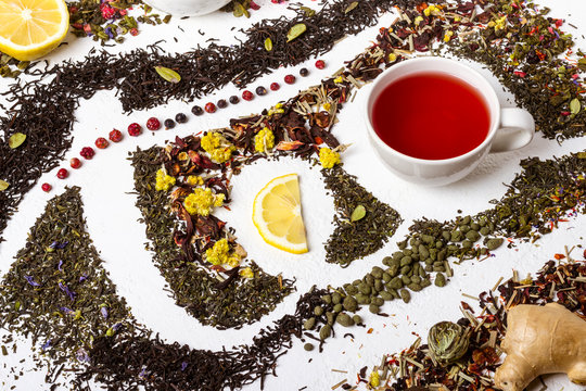 Fototapeta The word tea made from different variety of tea. Tea concept.