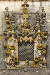 Facade of the Convent of Christ with its famous intricate Manueline window in medieval Templar castle in Tomar