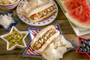 Summer holiday picnic with hot dogs and chips