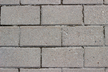 Concrete grey paving stones background 