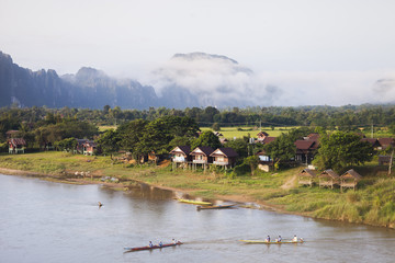 Landscape view of mountain and river at sunset timing with foggy  located at tropicana south east asia laos country