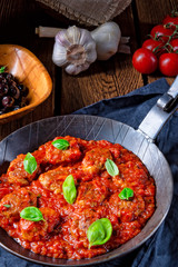 Rustic mini meatballs Baked in tomato sauce with basil
