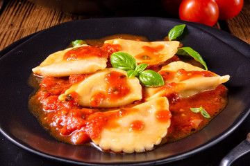 rustic Delicious Pasta - Ravioli in tomato sauce with basil