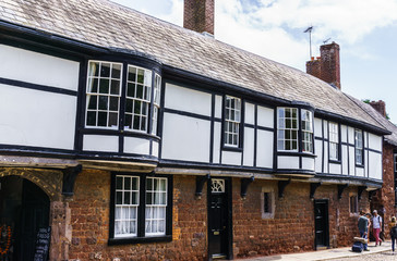 Exit.U.K. June 02, 2018. Beautiful, medieval houses around the square near the Exeter Cathedral. Devon, South West England, United Kingdom.