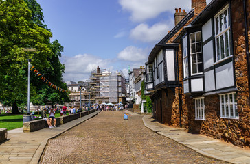 Fototapeta premium Exeter.U.K. June 02, 2018 Square near the old, beautiful and high cathedral