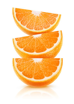 Three wedges of orange fruit on top of each other isolated on white background with clipping path