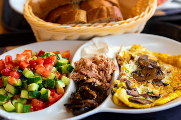 A delicious tradition Mediterranean breakfast in the port of Tel-Aviv, Israel. Selective focus.