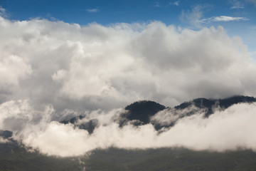 Landscape view of mountain with foggy under clear sky located at tropicana south east Asia. 