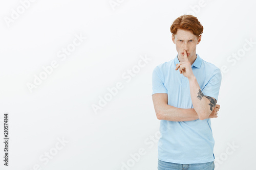 Studio Shot Of Serious Handsome Male Model With Ginger Hair