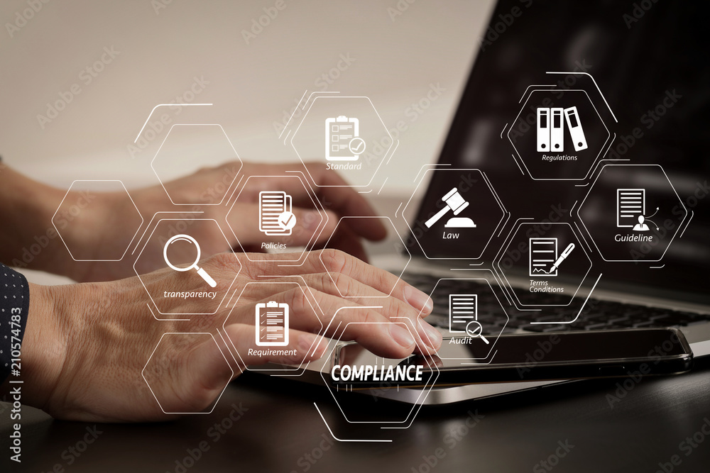 Poster close up of businessman hand working with smart phone and laptop and digital tablet computer in modern office
