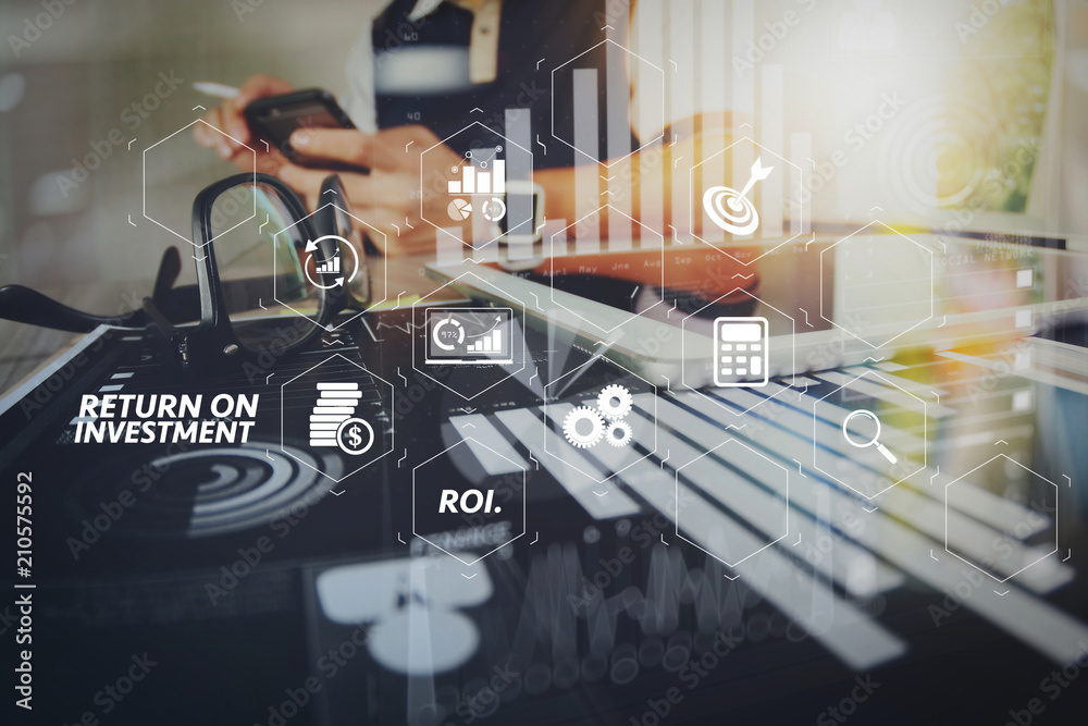 Aufkleber business documents on office table with smart phone and digital tablet and graph business with social network diagram and man working in the background