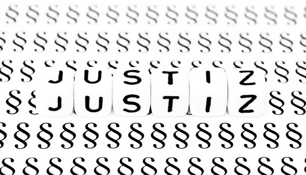 Justiz Symbol auf Paragraphenzeichen