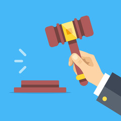 Hand holding auction hammer. Striking gavel. Auction, bidding concepts. Flat design. Vector illustration