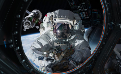 Fototapeta premium Astronaut working on a space station 3D rendering elements of this image furnished by NASA