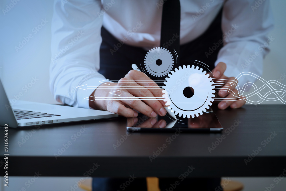 Aufkleber Thinking about structuring virtual diagram of business process with solutions. businessman working with digital tablet computer.