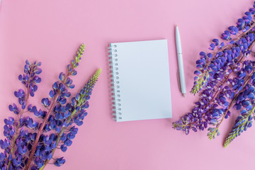 Mockup notebook with lupine flower