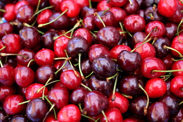 Heap of cherries, close-up, copy space
