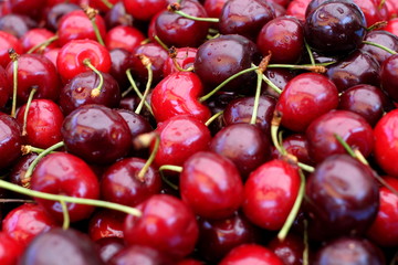 Heap of cherries, close-up, copy space