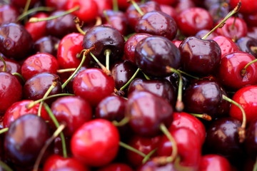 Heap of cherries, close-up, copy space