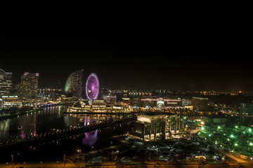 Water reflection of wonderful color at night time ,cityscape view at Yokohama japan