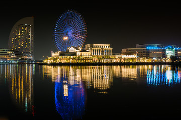 Water reflection of wonderful color at night time ,cityscape view at Yokohama japan