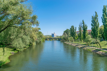 Fototapeta na wymiar Crisul Repede river in the center of Oradea in Bihor county, Crisana, Romania and in southeastern Hungary