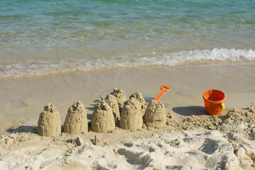 Fototapeta na wymiar Sand castle on the beach
