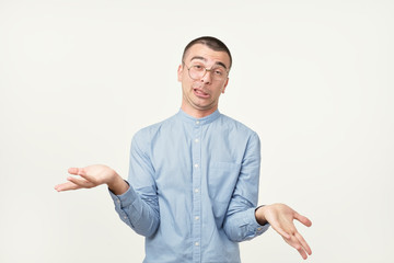 Portrait of hispanic crazy man. He lost his mind because of coming deadline and he has no time