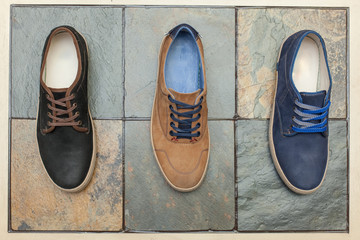 top view of three stylish shoes;