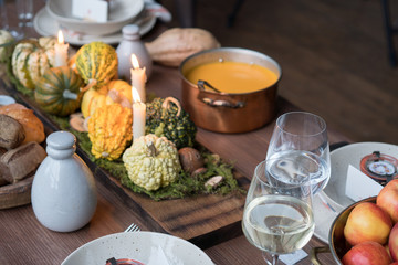 Autumn table setting with pumpkins. Thanksgiving dinner and fall decoration.