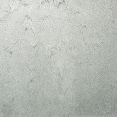 Textured background. Decorative plaster walls, external decoration of facade. Texture of beige