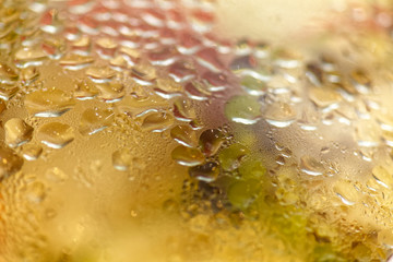 Close-up of a pan lid with droplets from a hot steam