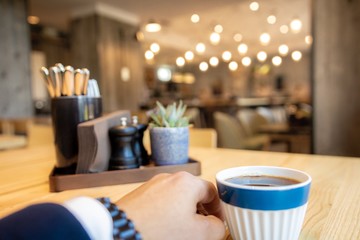 Guest at the restaurant enjoying morning coffee.