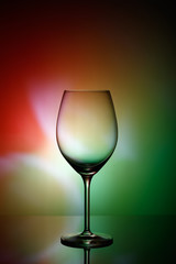 Glass of wine on a colored background