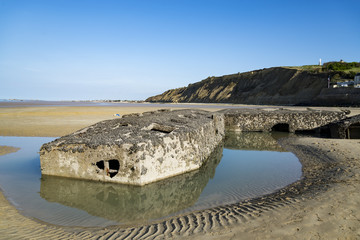 The remains of the Mulberry Harbour at Arromanches