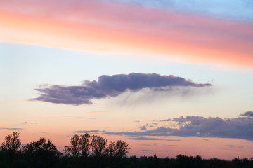 Elegant rain cloud at sunset of the day.