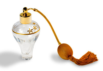 Perfume bottle with spray isolated on white background. Clipping path.