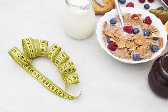 tape measure with healthy breakfast, diet concept