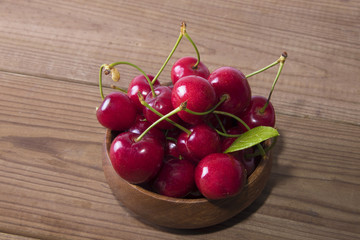 natural cherries on rustic wood