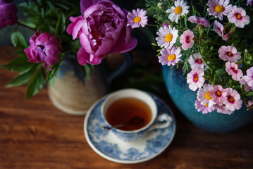 Flowers and Cup of tea at summertime