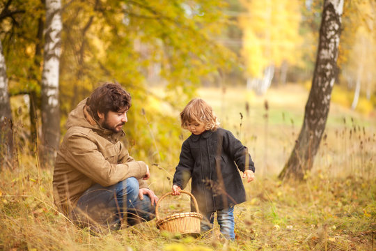 Father And Child In The Wild Forest