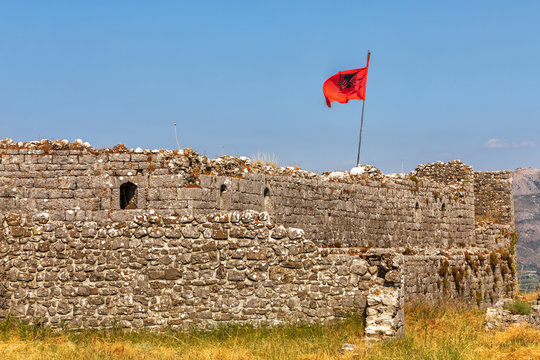 Albanian red flag and Ruins of Rozafa Castle, Shkoder, Albania.