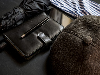 overhead businessman working elegant man supplies on black dark table