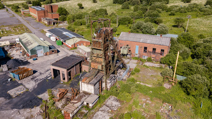 Aerial drone view of a closed, abandoned coal mine (Tower Colliery, South Wales)