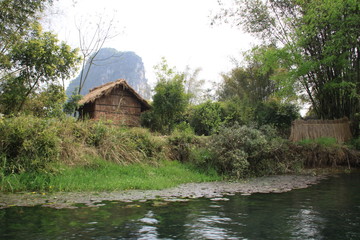 little old village in front of nice river 