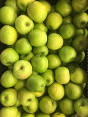 basket of green apples